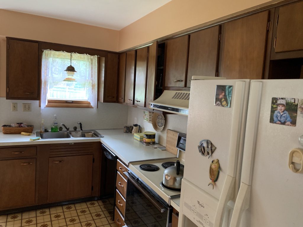 Inside of a home with a refrigerator.