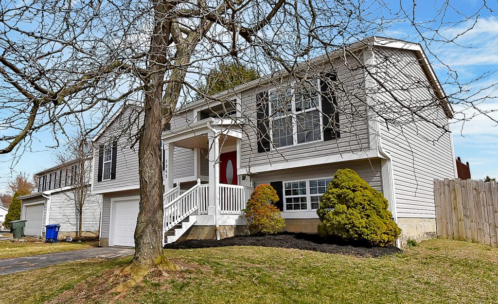Before and After: Hilliard Bought As-Is 3 Front side view 5968 Waterview Drive wm 2