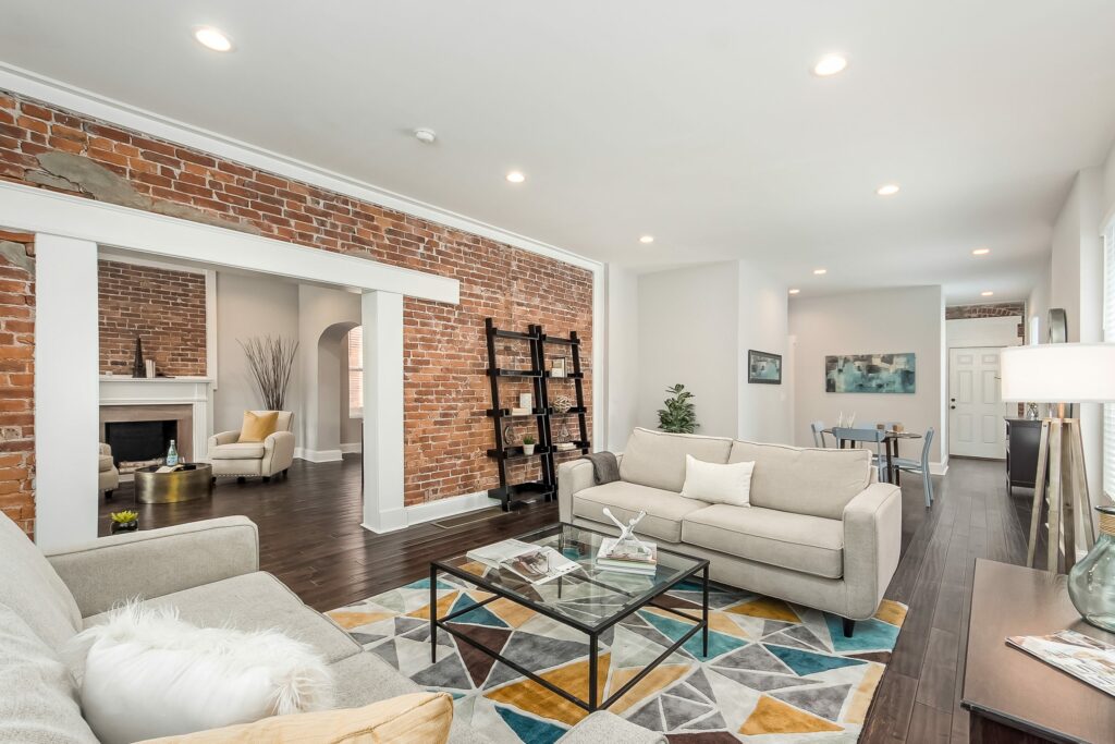 A glass coffee table in a living room.