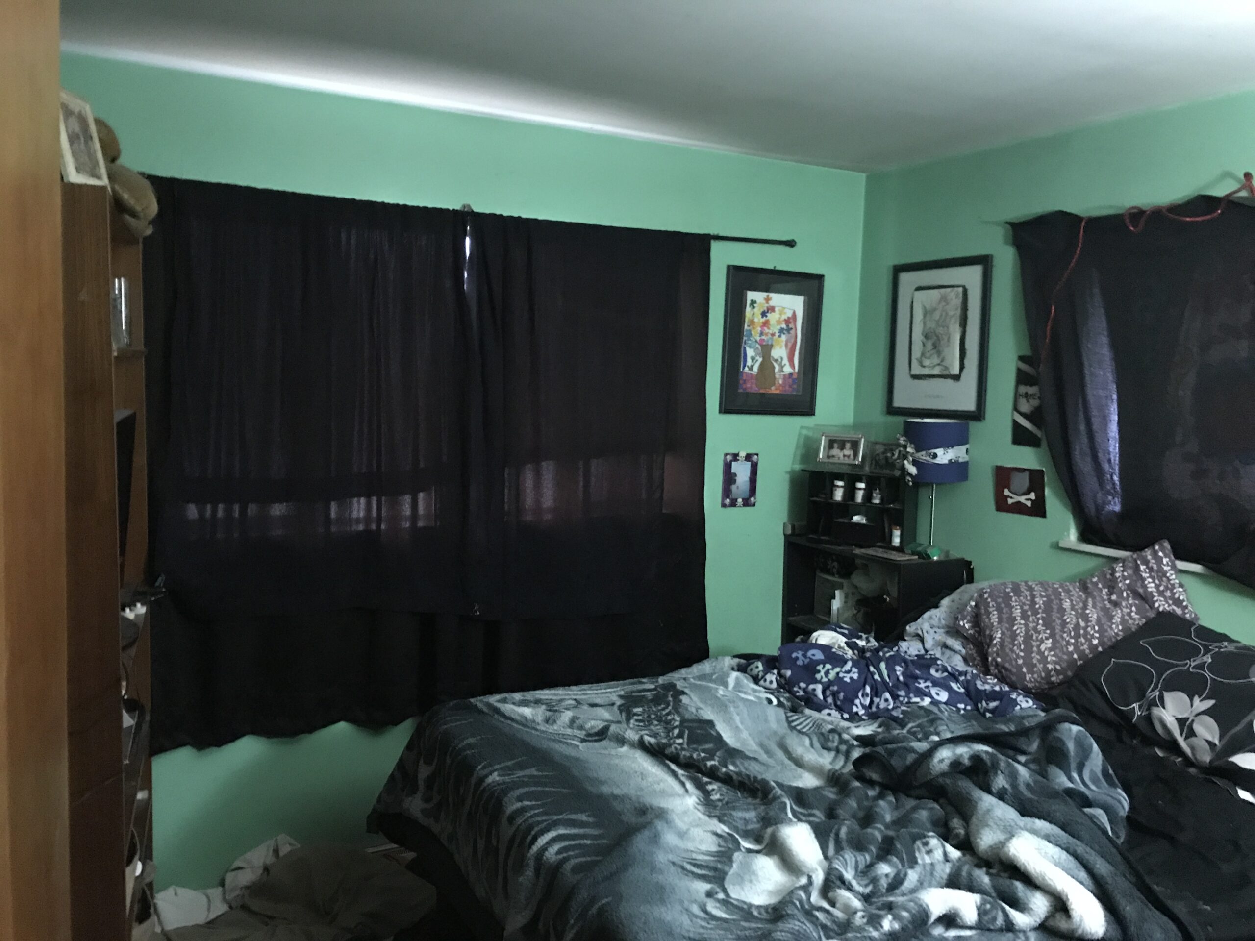 An ugly, messy bedroom prior to renovation.