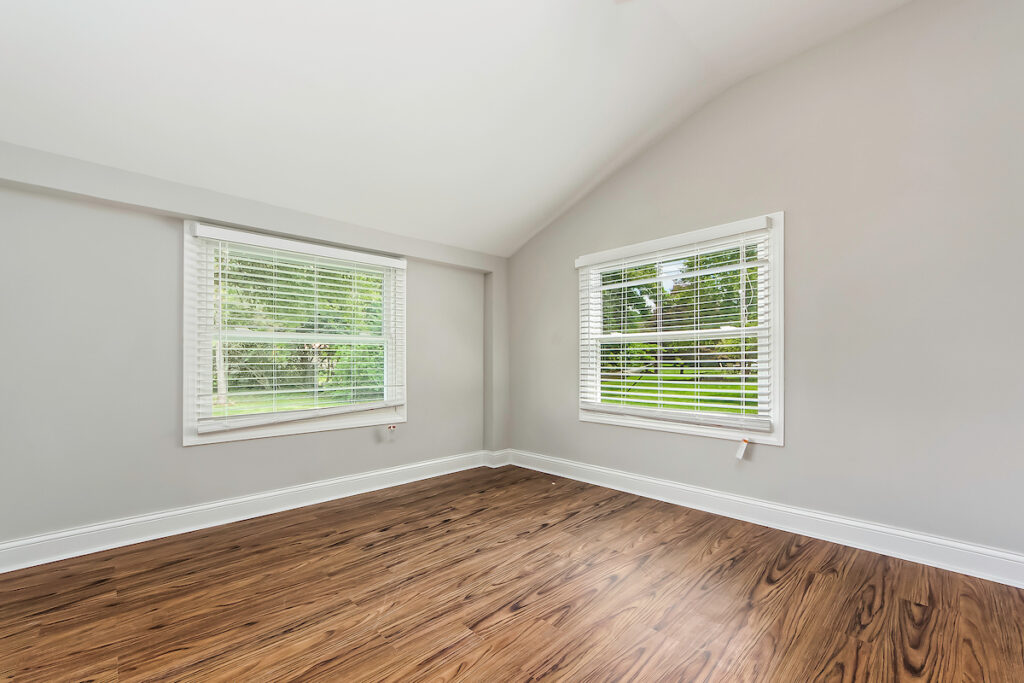 Bright brown tiling in a remodeled bedroom area.