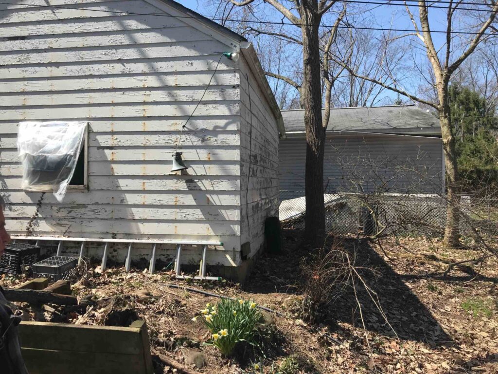 An ugly detached garage.