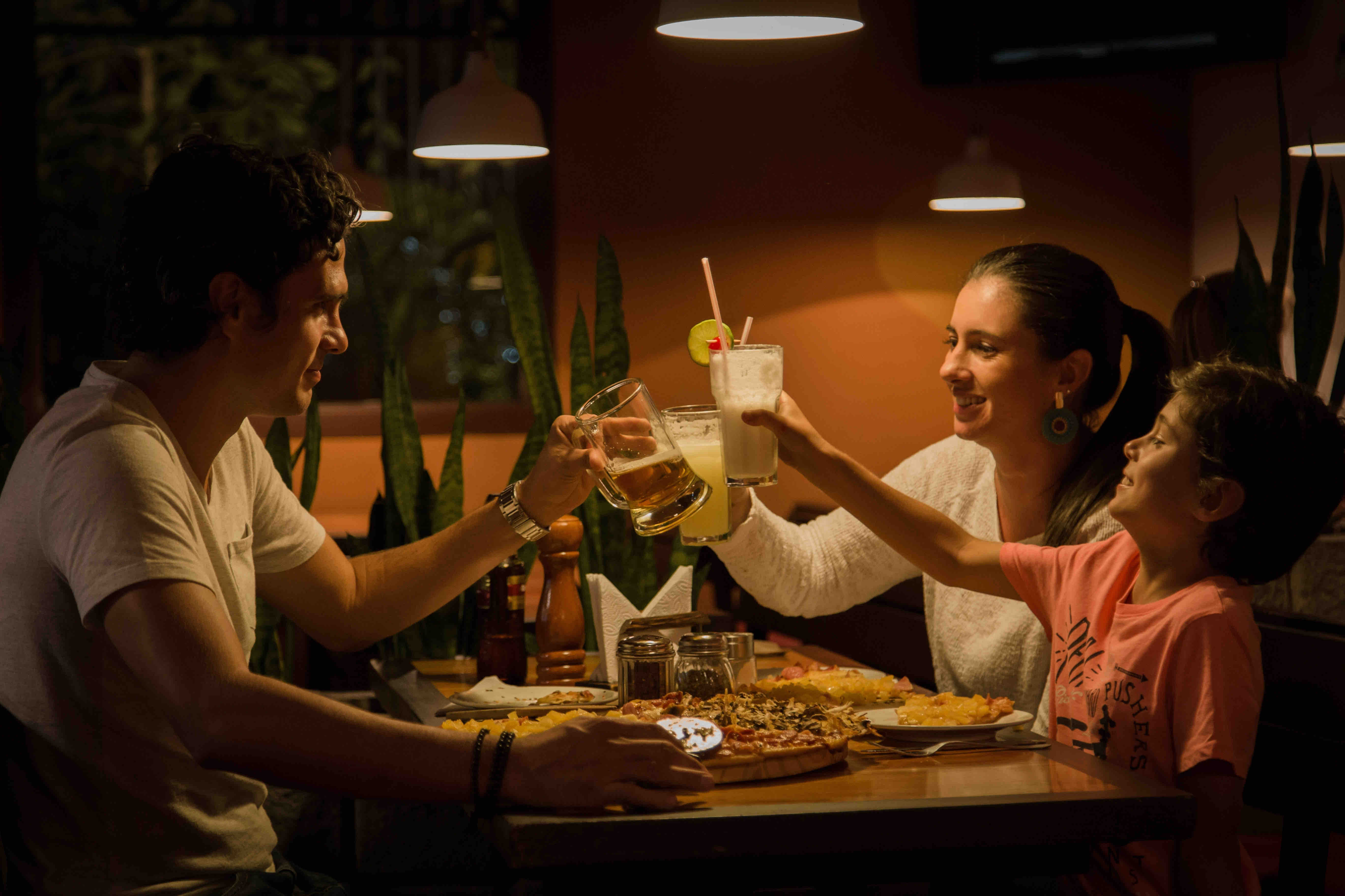 A family celebrating over dinner.